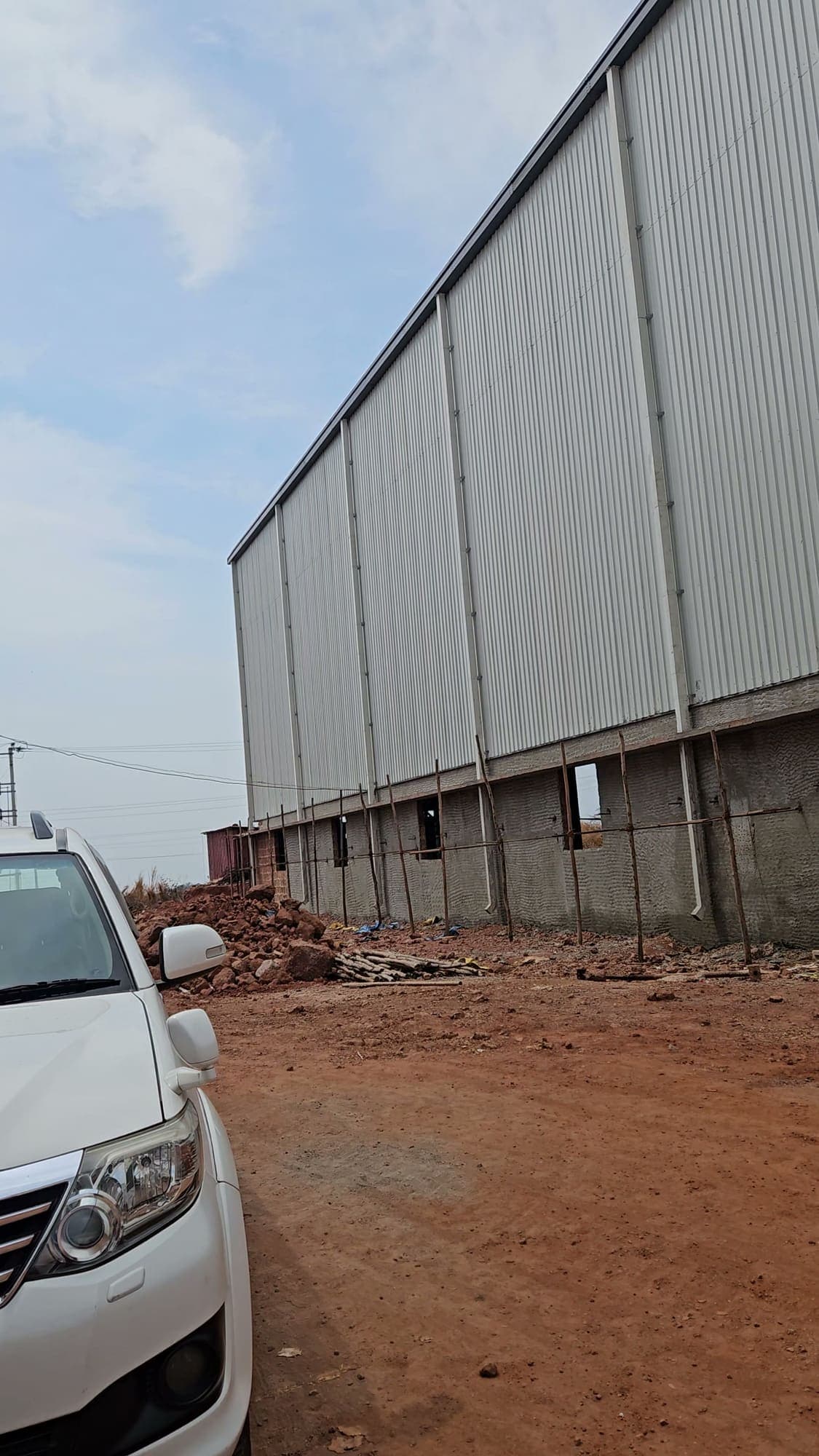 Side elevation of the stockyard with metal wall cladding