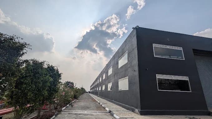 Corner of the Pelle & Carta manufacturing unit against the sky