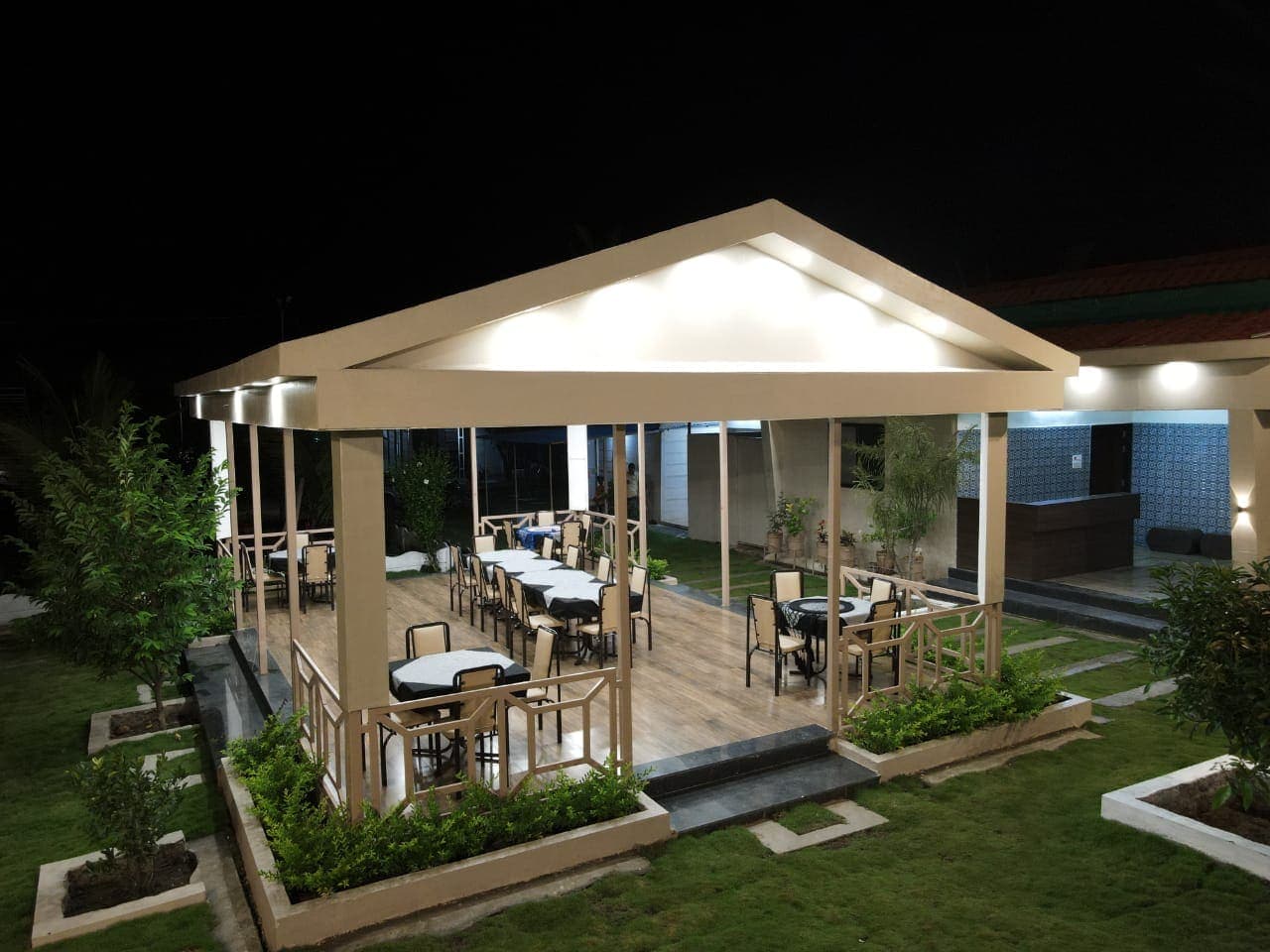 Open dining pavilion lit at night