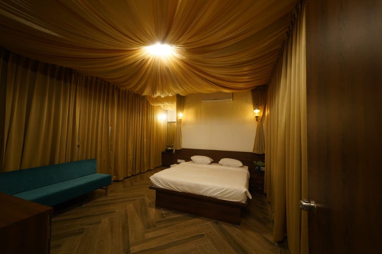 Guest room interior with timber floors