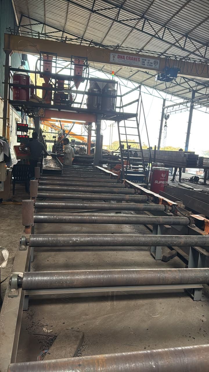 Submerged-arc welding gantry running along the H-beam line